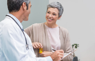 internal medicine doctor talking to patient